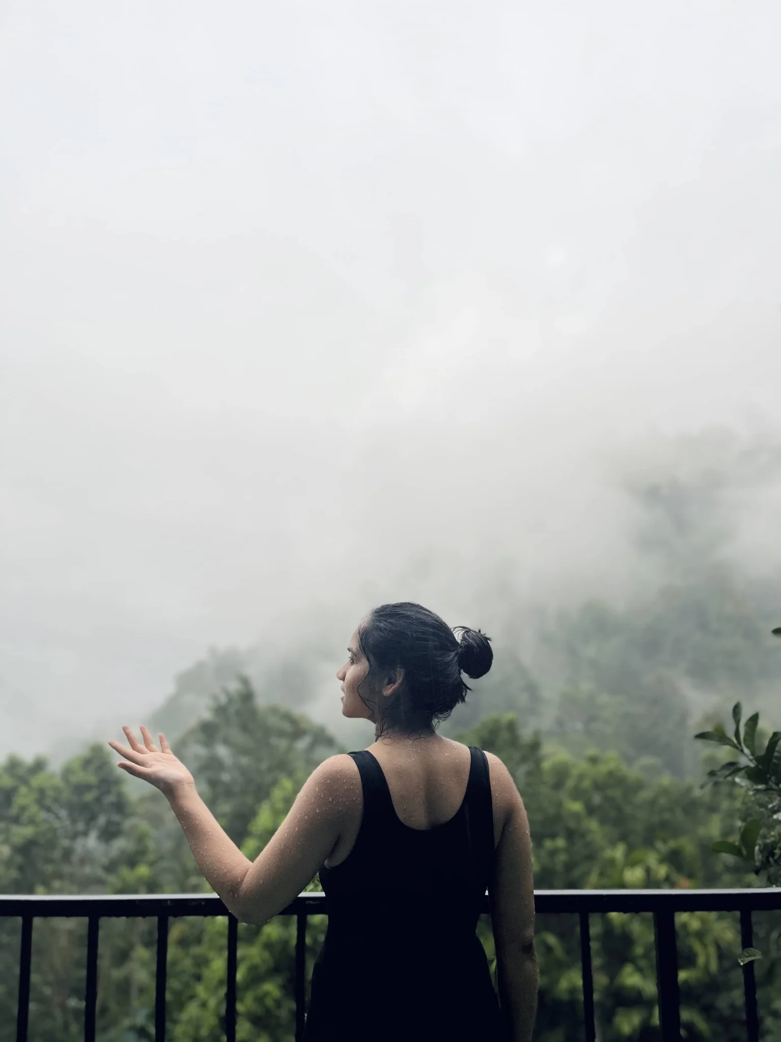 A girl enjoying the rain